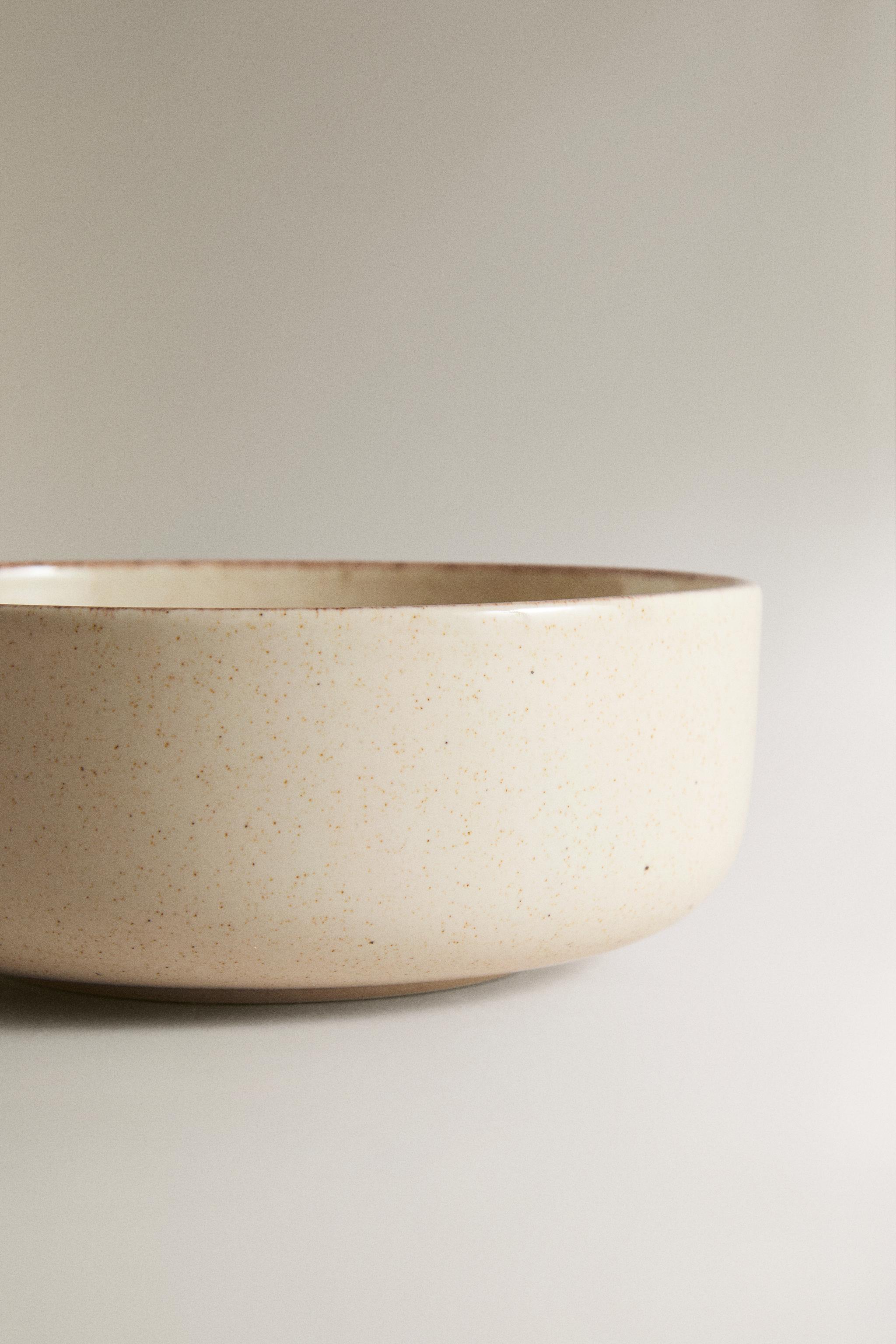 STONEWARE BOWL WITH AGED RIM